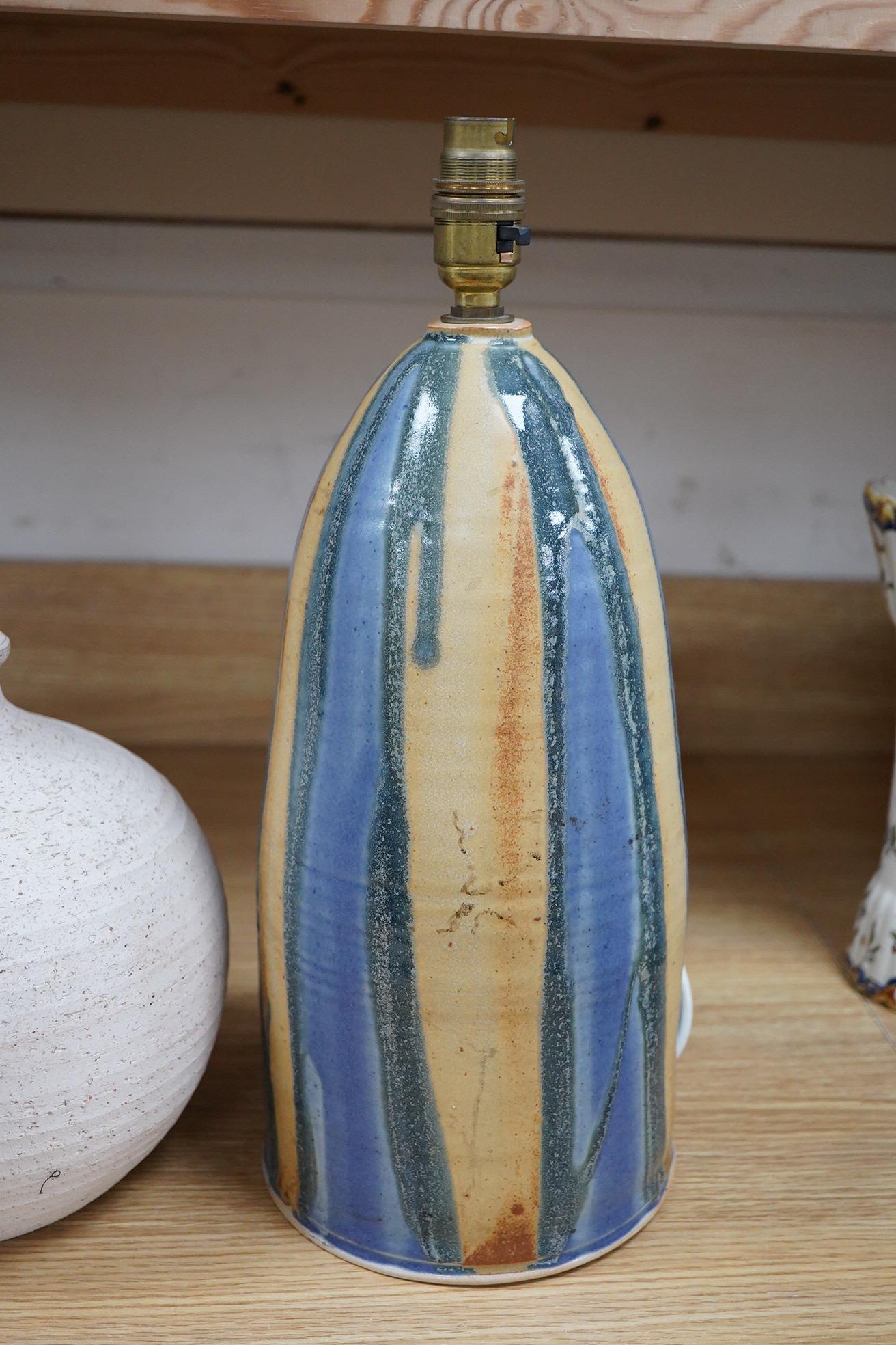 A 20th century Irish pottery lamp and another, tallest 34cm